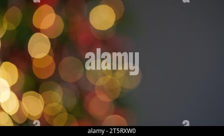Lots of red,gold and white sparkling lights on christmas tree,bokeh background.Beautiful shiny blurred new year background,holiday concept,bokeh.Chris Stock Photo