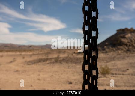 Dry Rain Chain In The Desert at a sustainable building Stock Photo