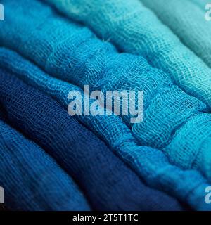 A set of vivid blue gauze fabrics. Gradient from dark to light shade. Fabric texture close-up. DIY and craft projects. Home Decor. Sea and wave mood o Stock Photo