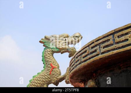 Dragon sculpture on the incense burner Stock Photo
