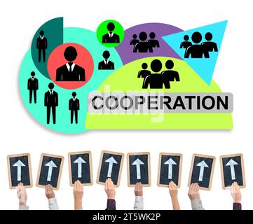 Hands holding writing slates with arrows pointing on cooperation concept Stock Photo