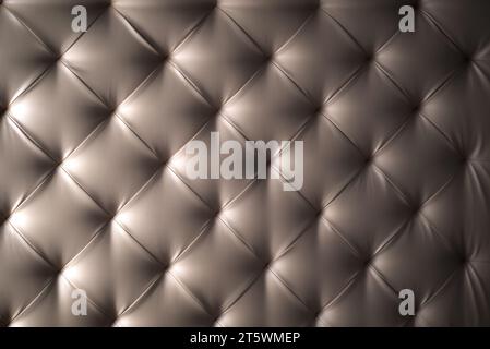 Furniture design, classic interior and modern material concept - gray minimalist leather quilted upholstery sofa, bed headboard Stock Photo