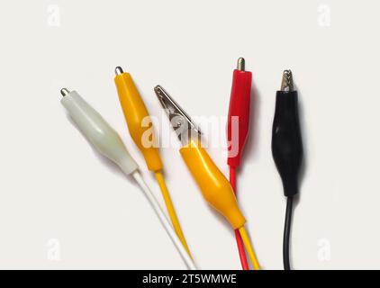Crocodile clip or alligator clip. Cables for temporary electrical connection. Stock Photo