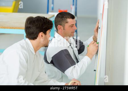 portrait of painter with apprentice Stock Photo