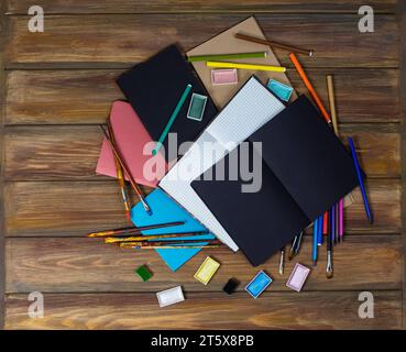 Creative colorful art supplies top view. Bright colorful background of art supplies. Stock Photo