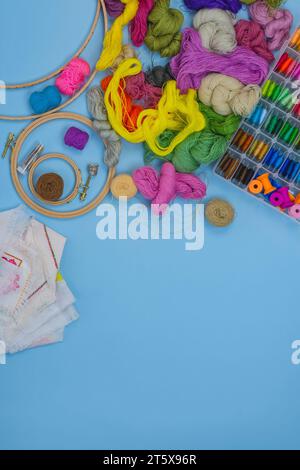 Set of different embroidery supplies. Set of items for embroidery. All for cross stitching and embroidery. Stock Photo