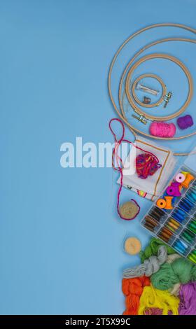 Assortment of embroidery tools. Embroidery and crafting tools. Accessories for embroidery on table. Stock Photo