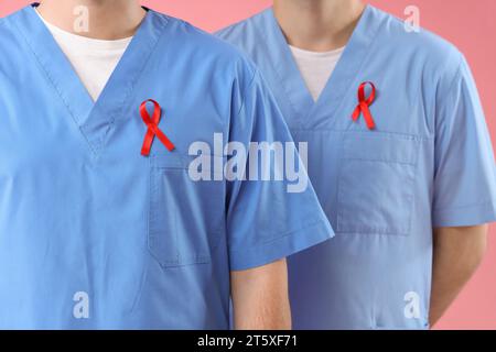 Red ribbons on World AIDS Day on the seawall of San Lorenzo beach. The ...