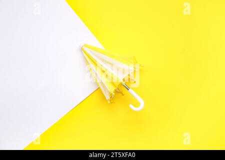 Mini stylish umbrella on colorful background Stock Photo