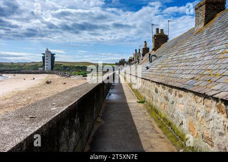 Back of a row of houses in the historic former fishing village of Footdee, built with their backs to the sea for protection.   Aberdeen, Scotland, UK Stock Photo