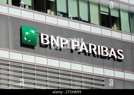 BNP Paribas signage and company logo on the exterior of a commercial building to get attention from people outside. Singapore. Stock Photo