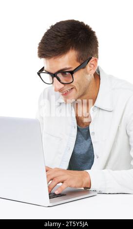 Geek, business man typing on laptop at desk or coding software isolated on a white background. Happy nerd in glasses on computer at table, technology Stock Photo