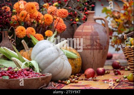 Autumn vegetable harvest and flower arrangement at the farmers market, autumn background Stock Photo