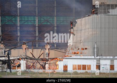 TUSTIN, CALIFORNIA - 7 NOV 2023: Closeup of the MCAS Tustin Blimp Hangar on fire. Stock Photo