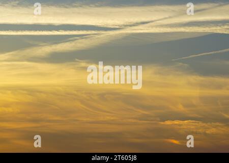 Beautiful sunset sky for background or sunrise sky and clouds in the morning, dramatic light, multicolor clouds, dramatic twilight sky background Stock Photo
