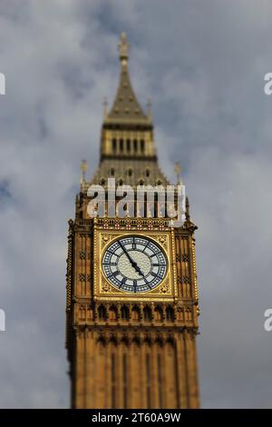 The Elizabeth Tower on a sunny day with a small whisp of white cloud. Ideal Westminster background, British screensaver, Houses of Parliament, Big Ben Stock Photo