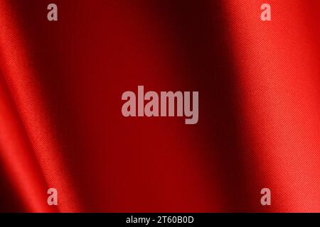 Background made wavy red linen fabric Stock Photo