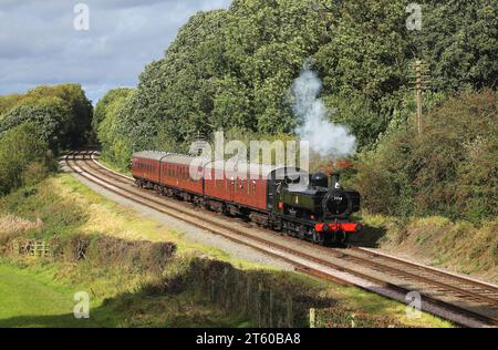 7714 visiting from the SVR passes Kinchley Lane during the GCR Gala. Stock Photo