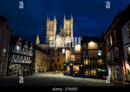 View along Castle Hill to Exchequer Gate and Lincoln Cathedral at night, Lincoln City, Lincolnshire, England, UK Stock Photo