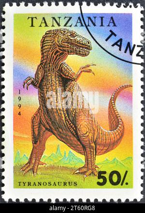 Cancelled postage stamp printed by Tanzania, that shows Tyrannosaurus Rex, circa 1994. Stock Photo