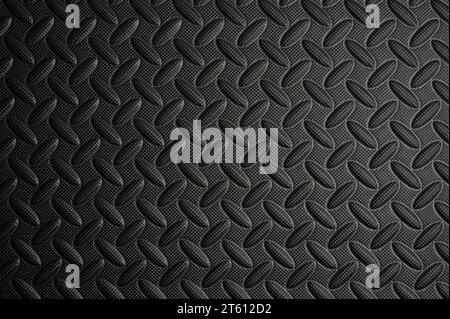Dark durable grilled shape background  pattern macro close up view Stock Photo