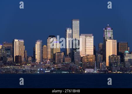 Seattle, WA, USA - October 28, 2023; Buildings of the Seattle Central Business District illuminated by setting sun Stock Photo