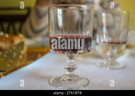 https://l450v.alamy.com/450v/2t61btr/a-glass-of-red-wine-on-the-table-2t61btr.jpg