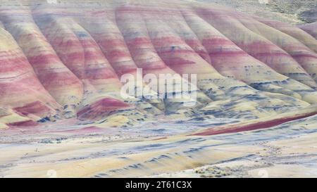 Colorful natural hillside in John Day Fossil Beds Painted Hills Unit National Monument in Central Oregon showing colorful rolling hills Stock Photo