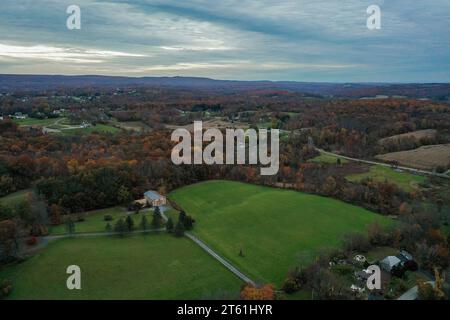Wantage Township, Sussex County, NJ, Lake Neepaulin,and Kittatinny Mountains with High Point late fall sunset aerial Stock Photo