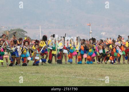 Row of young girls in traditional dress at Umhlanga reed dance festival 2023, Kingdom of Eswatini, group of children dancing, culture activity Stock Photo