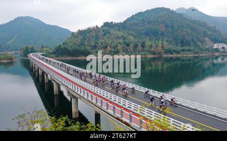 The 17th Qiandao Lake Road Cycling Race kicks off in Chun'an County, Hangzhou City, east China's Zhejiang Province, 5 November, 2023. Stock Photo