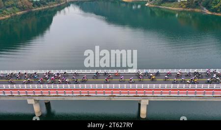 The 17th Qiandao Lake Road Cycling Race kicks off in Chun'an County, Hangzhou City, east China's Zhejiang Province, 5 November, 2023. Stock Photo