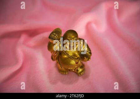 The statue of the happy Buddha in close-up Stock Photo