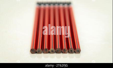Traditional wooden pencils with red and black colored. Stock Photo