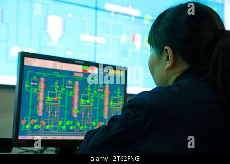 Luannan County - October 19, 2016: technical personnel in the monitoring and production system, Luannan, Hebei, China, Stock Photo