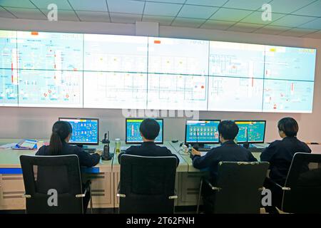 Luannan County - October 19, 2016: technical personnel in the monitoring and production system, Luannan, Hebei, China, Stock Photo