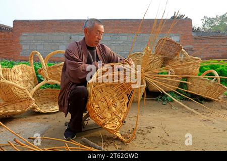 Luannan County - October 19, 2016: a Chinese peasant hand woven basket, Luannan County, Hebei Province, China Stock Photo