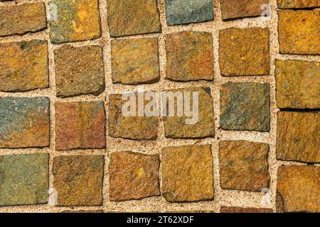 Paving slabs of various colours and shapes many uses including backgrounds, textures and wallpaper. Stock Photo