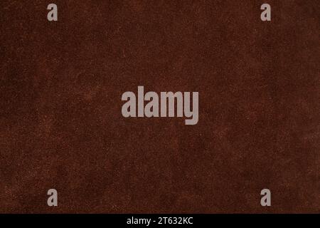 Dark brown suede leather natural background with rich texture and details Stock Photo