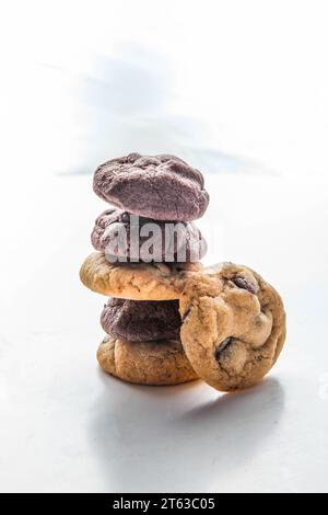 Chocolate chip and brownie cookie stack one on top of the other. Stock Photo