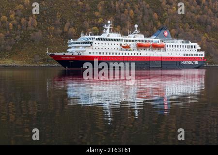 Hurtigruten MS Richard With cruiseship cruise ship at Hjorundfjorden fjord at Urke, Norway, Scandinavia, Europe in October Stock Photo