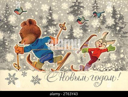 Vintage greeting postcard 'Happy New Year!', USSR,  1980. Merry hare laughs at a skier little bear against a winter nature Stock Photo