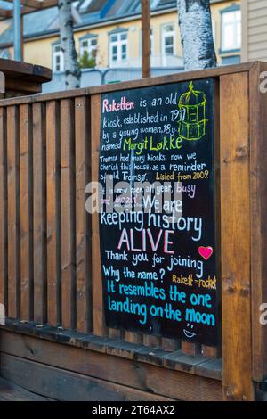 information board about Raketten kiosk (see additional info) at Tromso, Norway, Scandinavia, Europe - Rocket Norway's smallest bar since 2014 Stock Photo