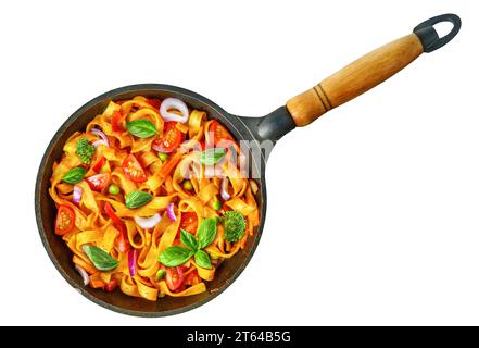 Tasty Pasta linguine in tomato sauce with vegetables, fresh tomatoes, basil in pan isolated on white background. View from above Stock Photo