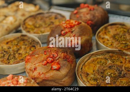 Delicious fresh pastries in a traditional bakery. Selective focus. Stock Photo