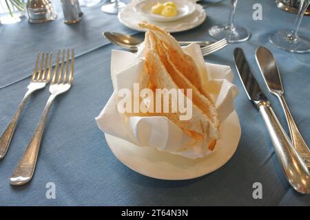 Melba toast at a table setting - John Gollop Stock Photo