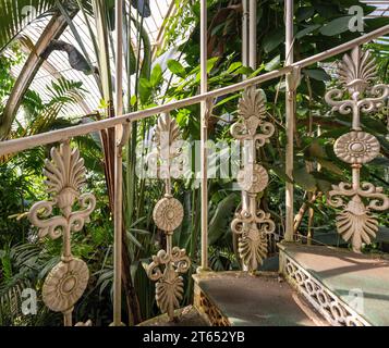Railings, cast-iron spiral staircase, Palm House, oldest Victorian greenhouse in the world, Royal Botanic Gardens, Kew, London, England, Great Britain Stock Photo