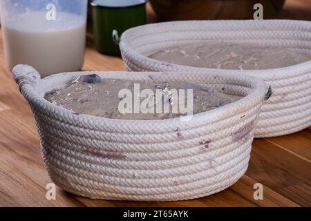 artisan bread dough in fermentation basket. Stock Photo