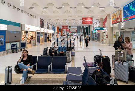 Bari, Puglia, Italy - October 2, 2023: Passengers waiting for flight inside Bari Karol Wojtyla International Airport. Stock Photo