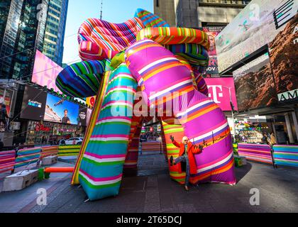 New York, USA. , . Argentinian conceptual pop artist Marta Minujín, 80, poses next to her 'Sculpture of Dreams' installation in Times Square. The vibrant, large-scale, 16-piece inflatable in the artist's signature stripes is Minujín's first public sculpture in New York City in her sixty-year career, and is presented to coincide with the Jewish Museum's major survey exhibition of her work, Marta Minujín: Arte! Arte! Arte!, opening on November 17. Credit: Enrique Shore/Alamy Live News Stock Photo